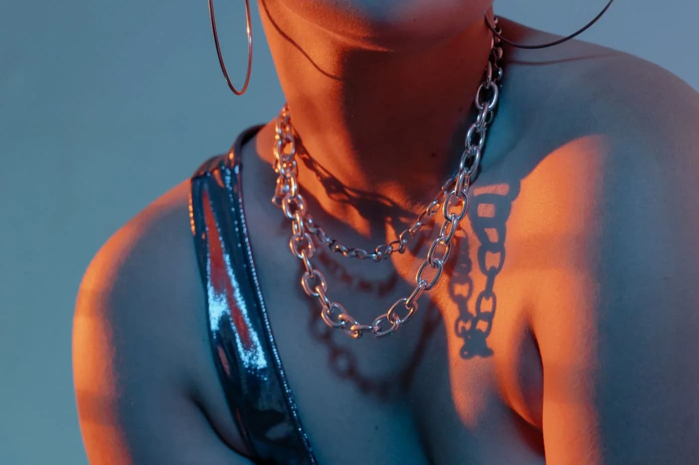 Editorial model wearing statement jewellery